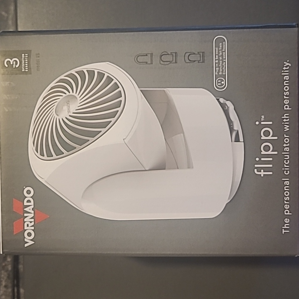 New in box! Vornado Flippi V6 White 2 speed adjustable plug in fan